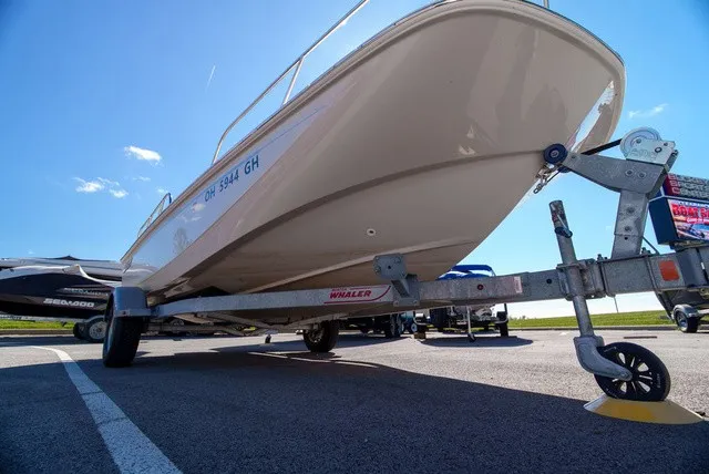 Slide: The Image of A 2022 Boston Whaler 170 Montauk on a trailer, ready for transport. - 5