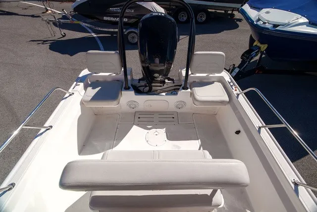 Slide: The Image of The image shows the cockpit of a 2022 Boston Whaler 170 Montauk with seating and a helm console. - 8