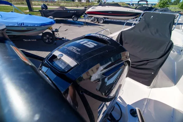 Slide: The Image of A 2022 Boston Whaler 170 Montauk with a Mercury 115 HP outboard motor. - 3