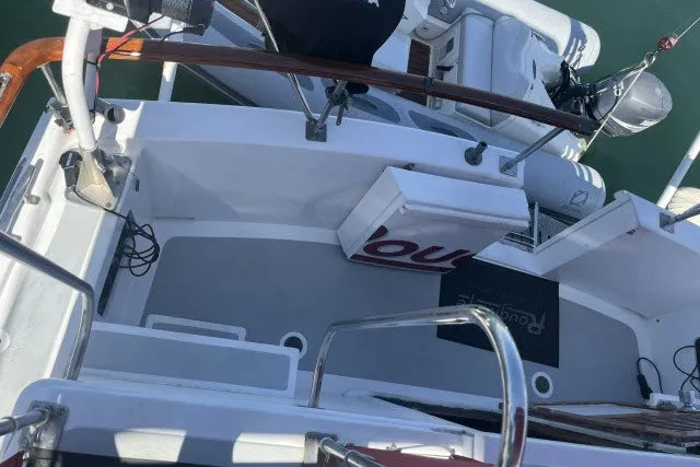 Slide: The Image of Cockpit view of 1983 Roughwater 41 boat with clean deck and railing. - 29