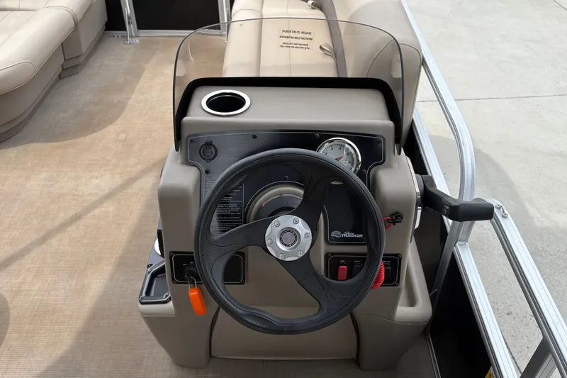 Slide: The Image of Steering console of 2025 Sun Tracker Party Barge 16 DLX pontoon boat. - 19