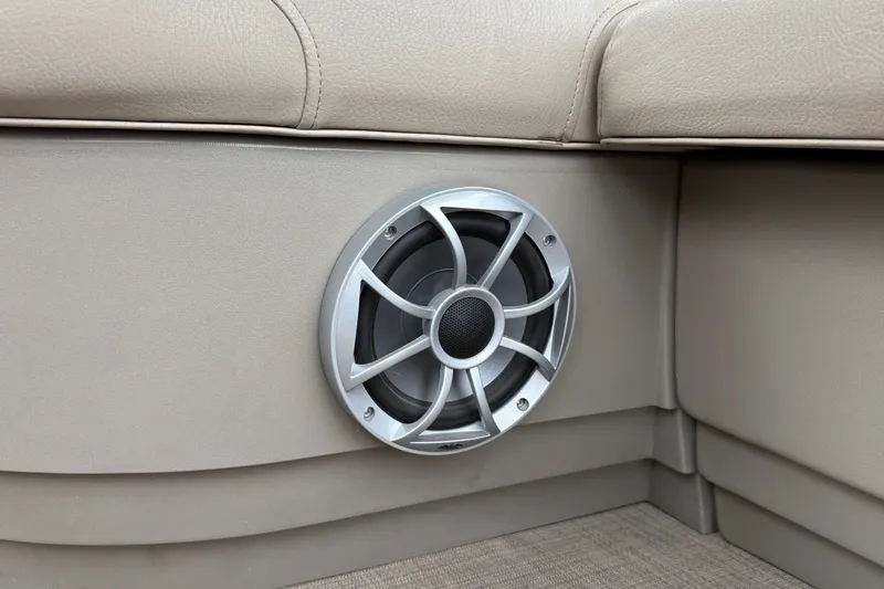 Slide: The Image of Speaker on Sun Tracker Party Barge 16 DLX 2025, beige interior detail. - 17