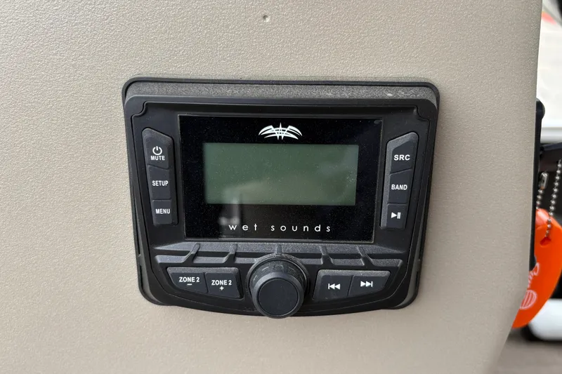 Slide: The Image of Wet Sounds audio system on 2025 Sun Tracker Party Barge 16 DLX boat. - 16