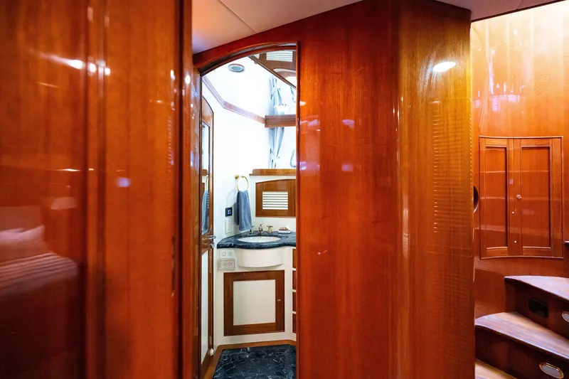 Slide: The Image of Luxurious wooden interior of 2009 Marlow 61C yacht with elegant bathroom. - 94