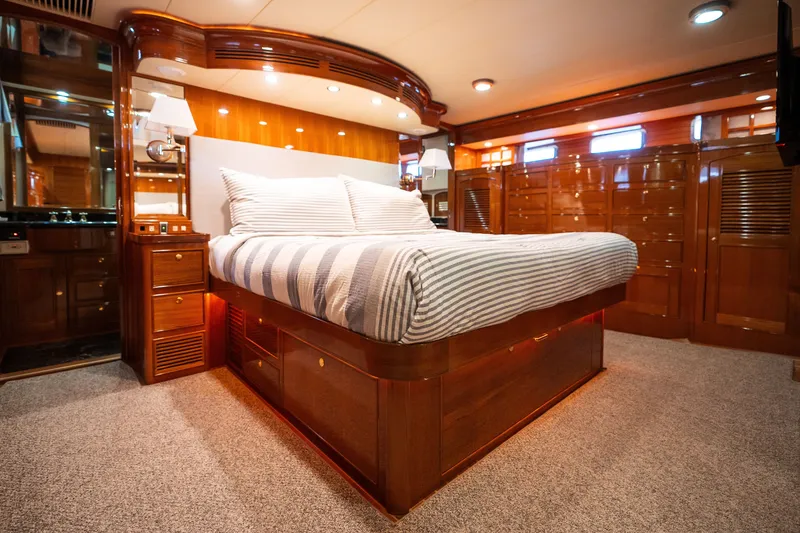 Slide: The Image of Luxurious cabin interior of 2009 Marlow 61C yacht with elegant wood finishes. - 108