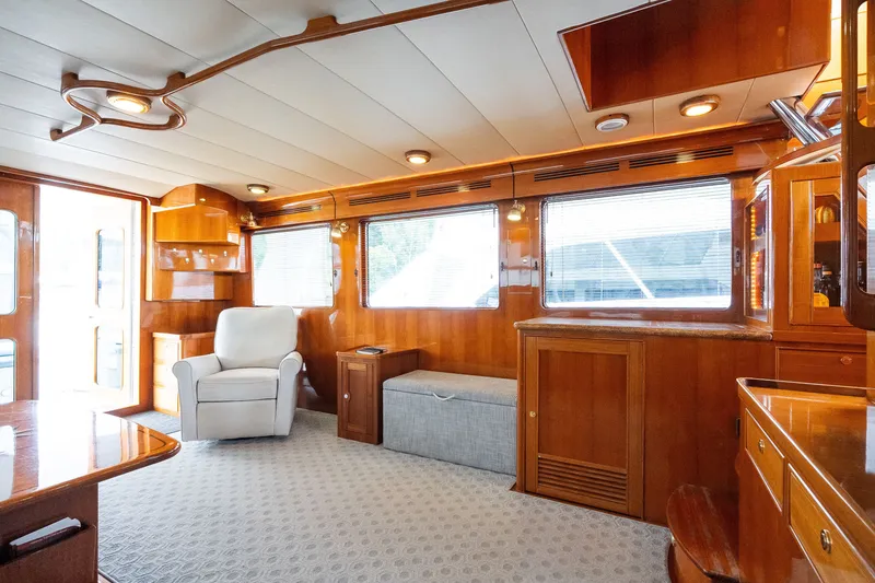 Slide: The Image of Luxurious interior of 2009 Marlow 61C yacht with elegant wood finishes and comfortable seating. - 33