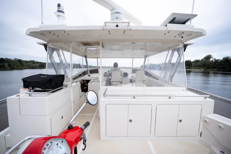 Slide: The Image of Luxury Marlow 61C yacht interior, 2009 model, cruising on a serene river. - 81