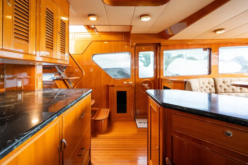 Slide: The Image of Luxurious interior of 2009 Marlow 61C yacht with polished wood and elegant furnishings. - 47