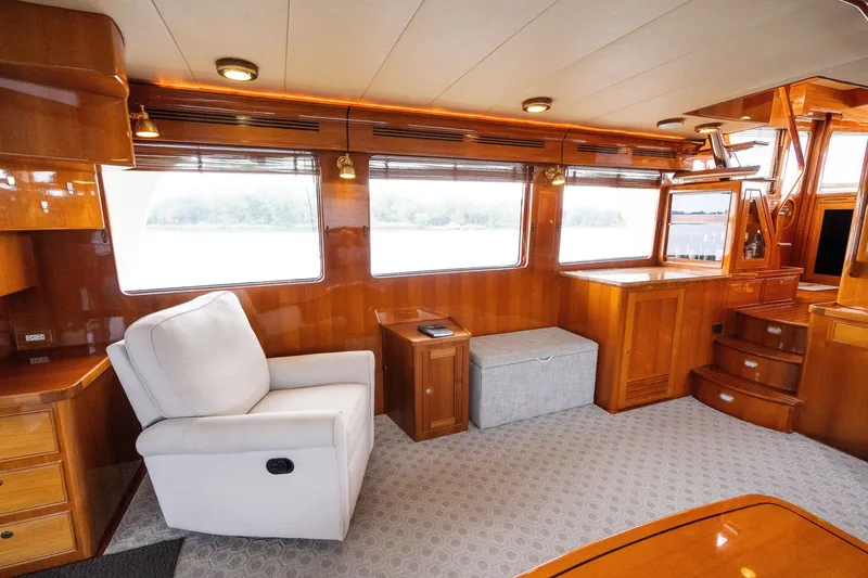 Slide: The Image of Luxurious interior of 2009 Marlow 61C yacht with plush seating and wooden finishes. - 38