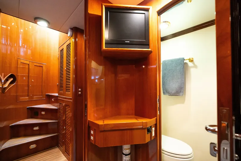 Slide: The Image of Luxurious Marlow 61C yacht interior with wooden finishes and modern amenities, 2009 model. - 88