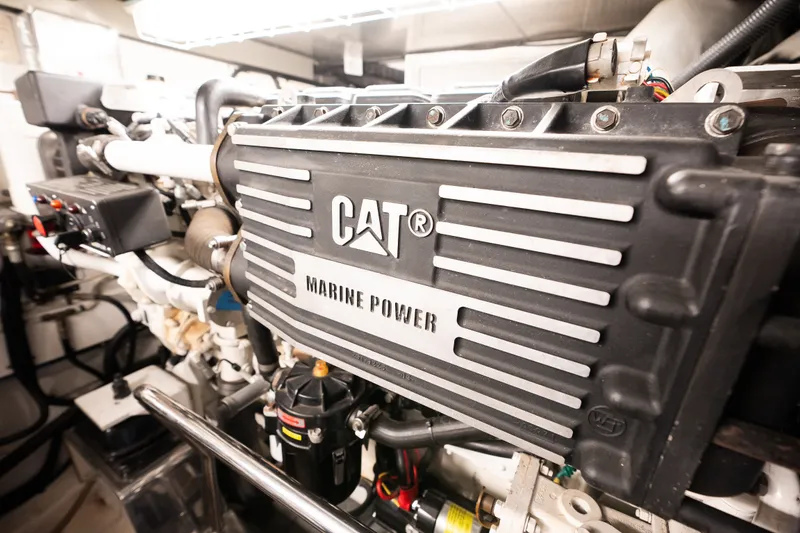 Slide: The Image of Engine room of 2009 Marlow 61C yacht featuring CAT Marine Power engine. - 133