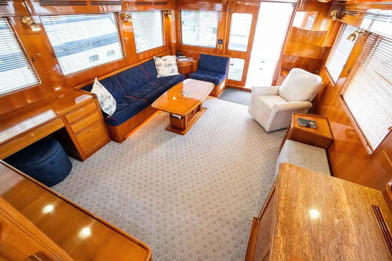 Slide: The Image of Luxurious interior of 2009 Marlow 61C yacht with elegant wood finishes and comfortable seating. - 36