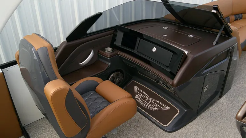 Slide: The Image of The image shows the cockpit of a 2027 Bennington 27 QXSBA with sleek, modern design. - 13