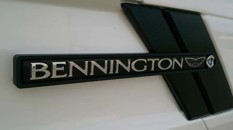 Slide: The Image of Close-up of the Bennington logo on a boat. - 5