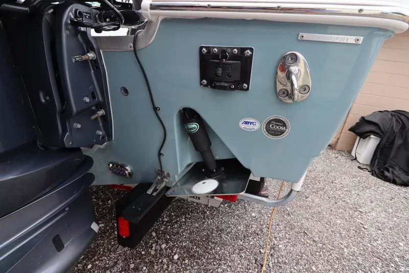 Slide: The Image of 2021 Sea Hunt Ultra 275SE boat transom with motor mount and hardware details. - 5