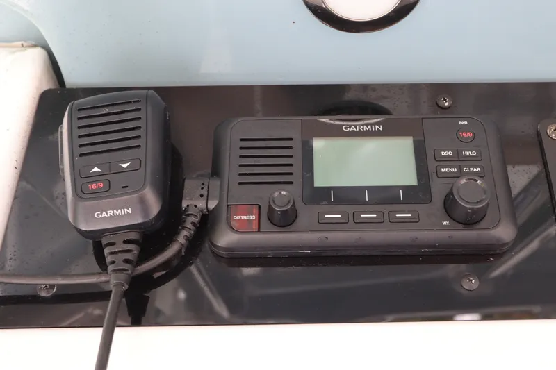 Slide: The Image of Garmin marine radio system on 2021 Sea Hunt Ultra 275SE boat dashboard. - 21