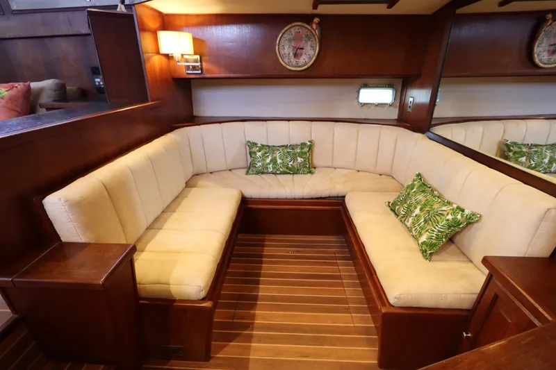 Slide: The Image of Elegant interior of 1985 Viking 50 Cockpit Motor Yacht with plush seating and tropical cushions. - 28