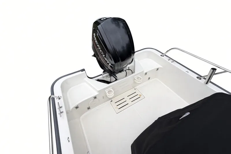 Slide: The Image of 2017 Boston Whaler 170 Montauk boat with Mercury outboard motor, rear deck view. - 21