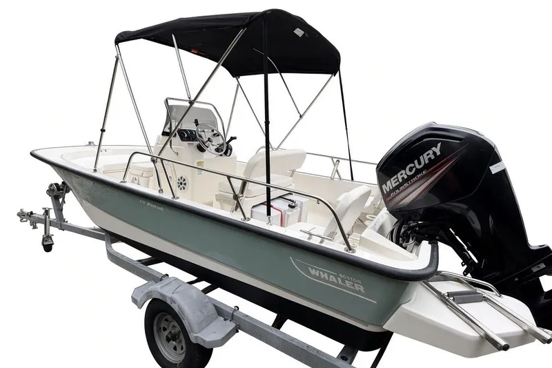 Slide: The Image of 2017 Boston Whaler 170 Montauk boat with Mercury engine on trailer. - 7