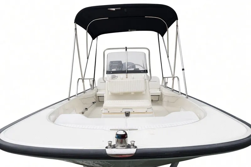 Slide: The Image of 2017 Boston Whaler 170 Montauk boat with canopy, front view. - 4
