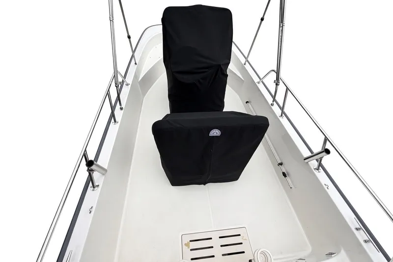 Slide: The Image of 2017 Boston Whaler 170 Montauk boat interior with black seat covers. - 19