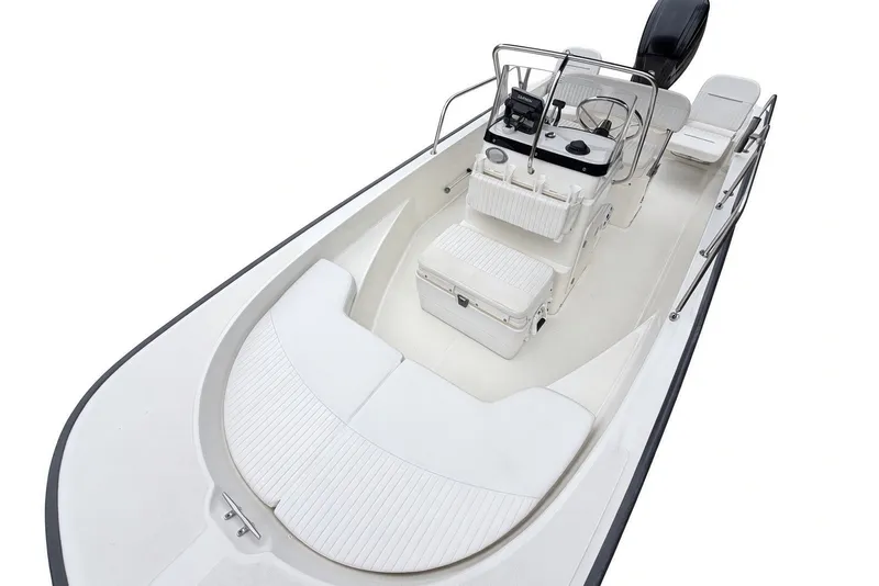 Slide: The Image of 2017 Boston Whaler 170 Montauk boat interior with seating and console. - 12