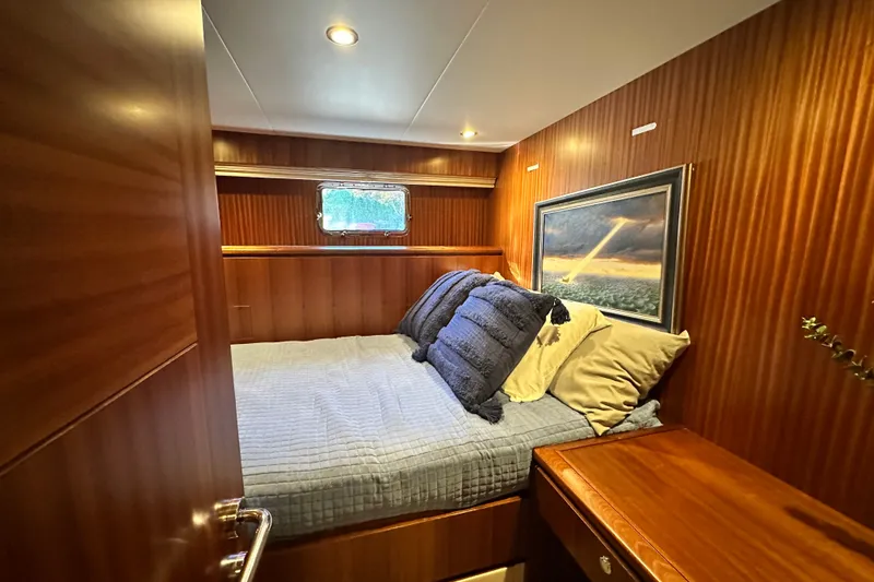 Slide: The Image of Luxurious cabin interior of 2012 Ocean Alexander 85 E yacht with cozy bedding. - 98