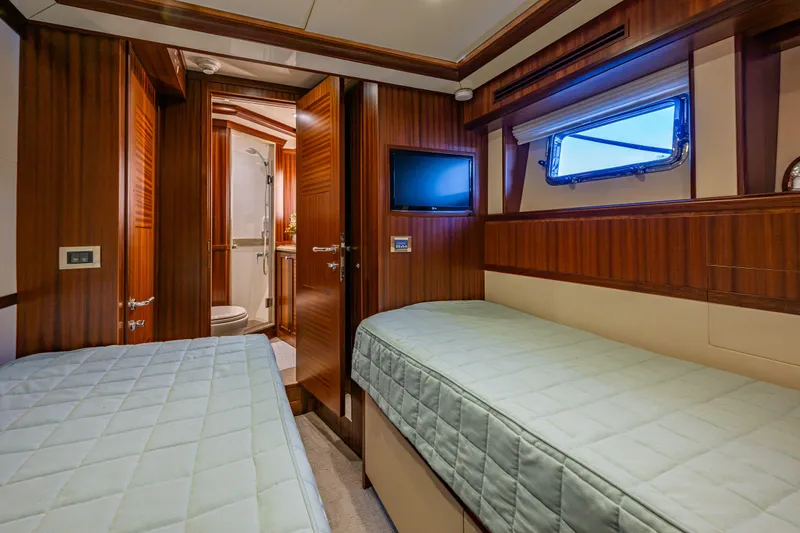 Slide: The Image of Luxurious cabin interior of 2012 Ocean Alexander 85 E yacht with twin beds and ensuite bathroom. - 53