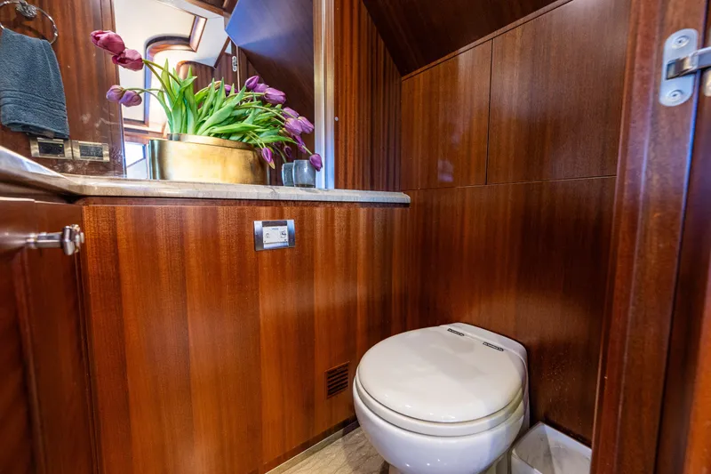 Slide: The Image of Luxurious wooden bathroom interior on 2012 Ocean Alexander 85 E yacht. - 96