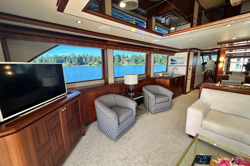Slide: The Image of Luxurious interior of 2012 Ocean Alexander 85 E yacht with elegant seating and scenery all around.. - 25