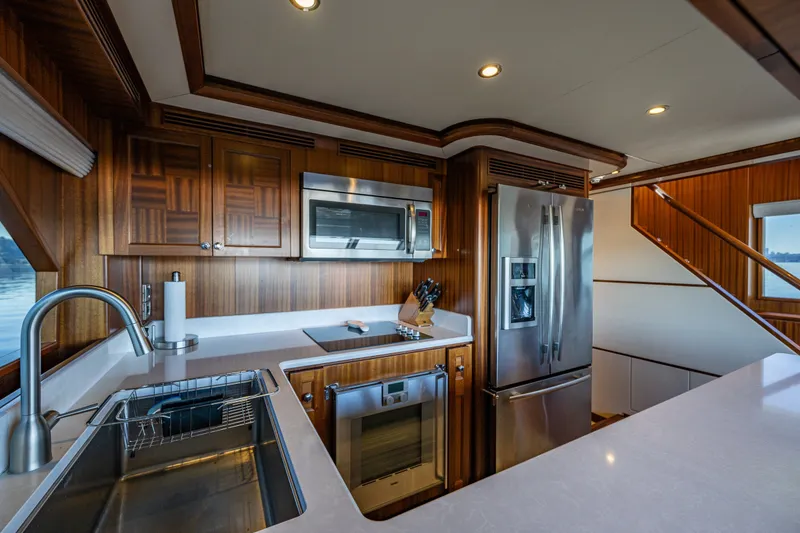 Slide: The Image of Luxurious kitchen interior of 2012 Ocean Alexander 85 E yacht with modern appliances. - 66