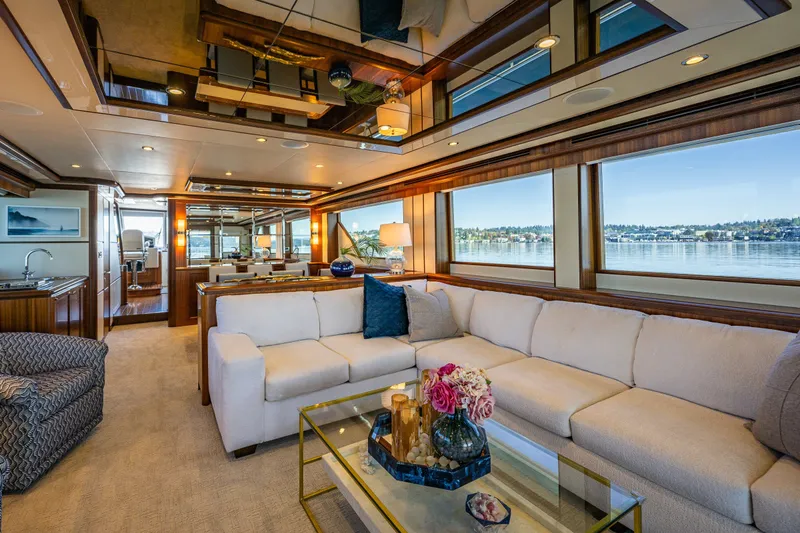 Slide: The Image of Luxurious interior of 2012 Ocean Alexander 85 E yacht with elegant furnishings and panoramic windows. - 23