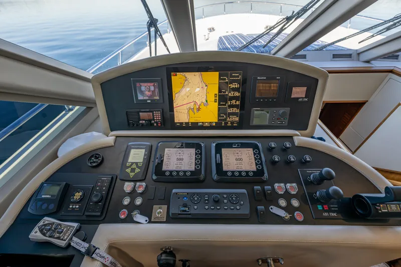 Slide: The Image of Cockpit of 2012 Ocean Alexander 85 E yacht with navigation and control systems. - 79