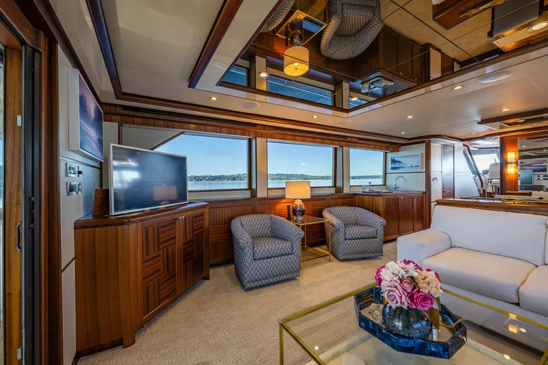 Slide: The Image of Luxurious interior of 2012 Ocean Alexander 85 E yacht with elegant furnishings and panoramic windows. - 19