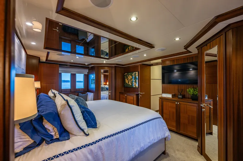 Slide: The Image of Luxurious bedroom interior of 2012 Ocean Alexander 85 E yacht with elegant wood finishes. - 40