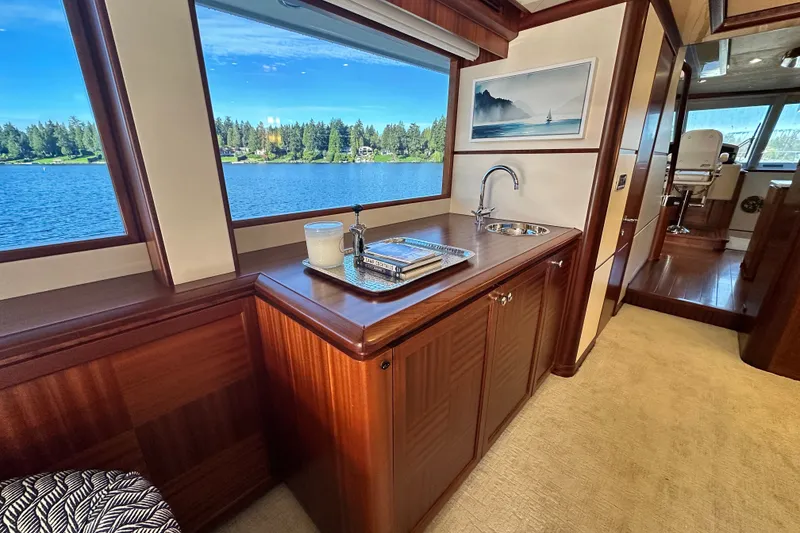 Slide: The Image of Luxurious interior of 2012 Ocean Alexander 85 E yacht with scenic water view. - 21