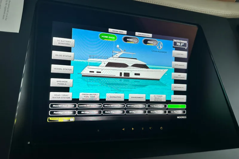 Slide: The Image of Touchscreen control panel of a 2012 Ocean Alexander 85 E yacht, displaying vessel systems. Modern top to bottom OctoPlex by Maritron G2 Series - 32