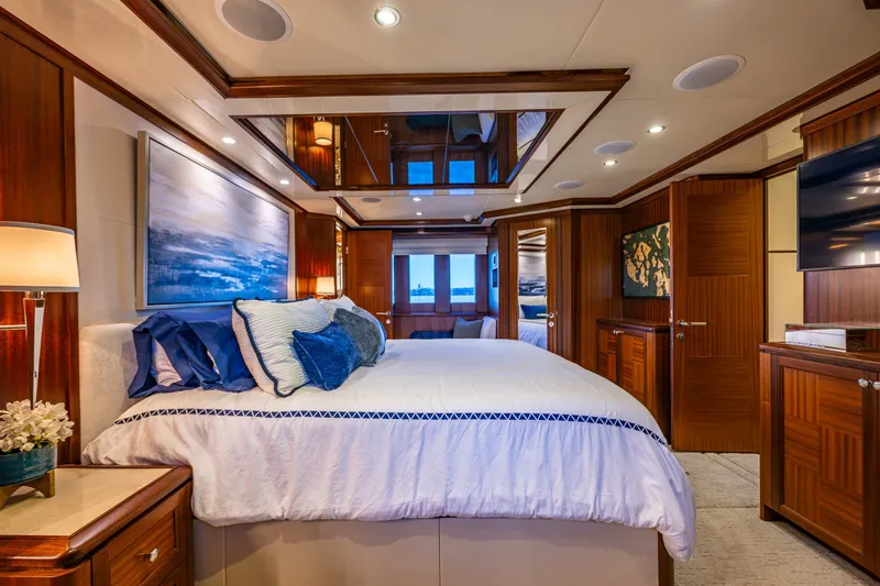 Slide: The Image of Luxurious bedroom interior of 2012 Ocean Alexander 85 E yacht with elegant wood finishes. - 39