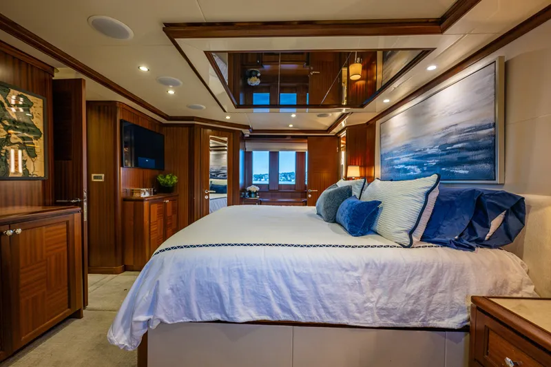 Slide: The Image of Luxurious bedroom interior of 2012 Ocean Alexander 85 E yacht with elegant wood finishes. - 38