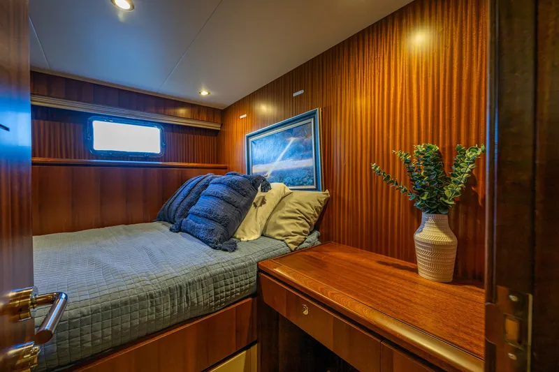 Slide: The Image of Luxurious cabin interior of 2012 Ocean Alexander 85 E yacht with cozy bedding and elegant decor. - 62