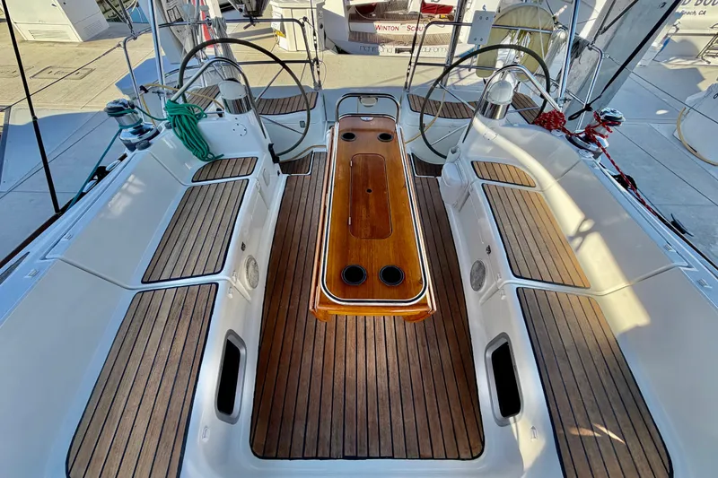 Slide: The Image of Cockpit of 2007 Jeanneau Sun Odyssey 49 DS with teak flooring and dual steering wheels. - 30