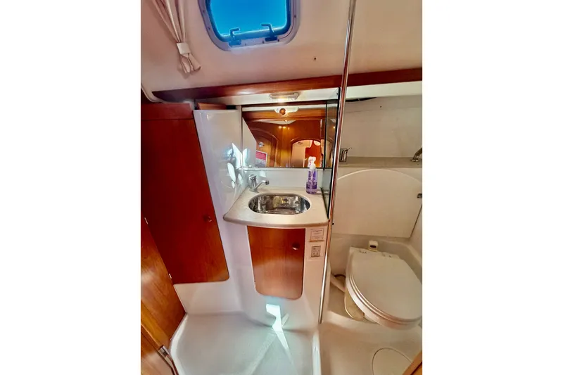 Slide: The Image of Interior of 2007 Jeanneau Sun Odyssey 49 DS yacht bathroom with sink and toilet. - 96