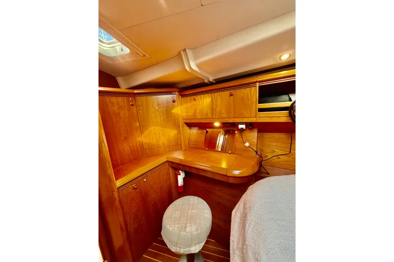 Slide: The Image of Interior of 2007 Jeanneau Sun Odyssey 49 DS yacht with wooden cabinetry and seating. - 82