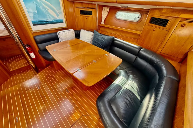 Slide: The Image of Luxurious interior of 2007 Jeanneau Sun Odyssey 49 DS yacht with elegant wood finish. - 76