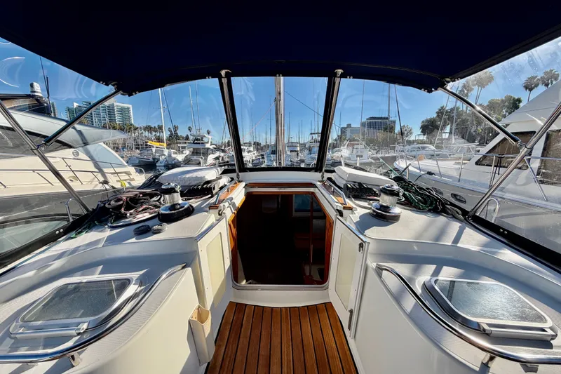 Slide: The Image of Cockpit view of 2007 Jeanneau Sun Odyssey 49 DS sailboat in marina. - 90
