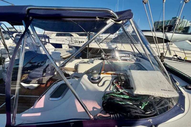 Slide: The Image of 2007 Jeanneau Sun Odyssey 49 DS sailboat cockpit with clear canopy and ropes. - 28