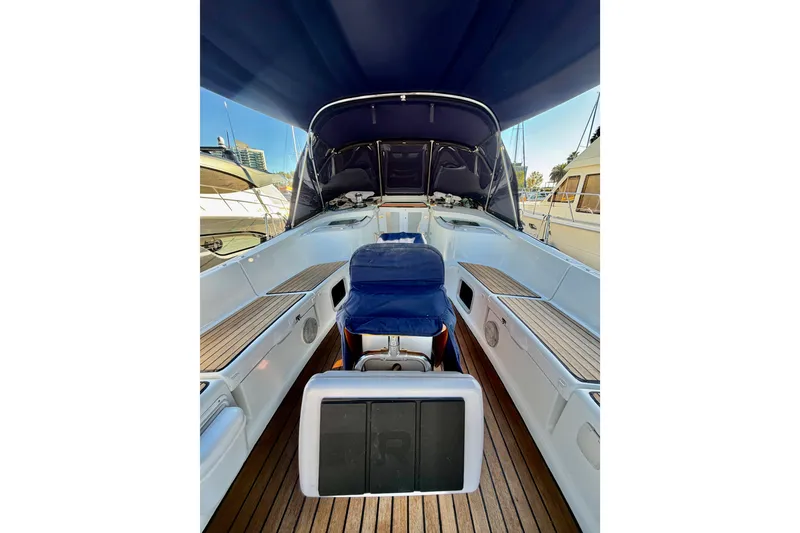 Slide: The Image of Cockpit view of 2007 Jeanneau Sun Odyssey 49 DS sailboat with blue canopy. - 13