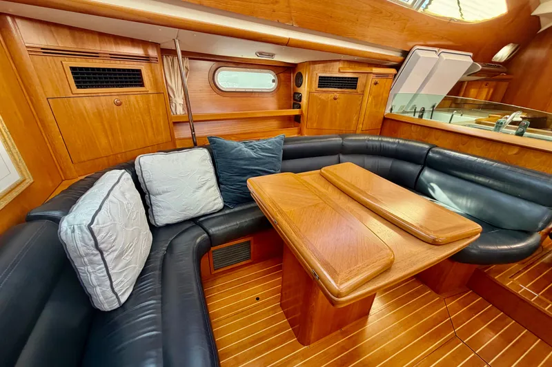 Slide: The Image of Luxurious interior of 2007 Jeanneau Sun Odyssey 49 DS yacht with wooden furnishings. - 57