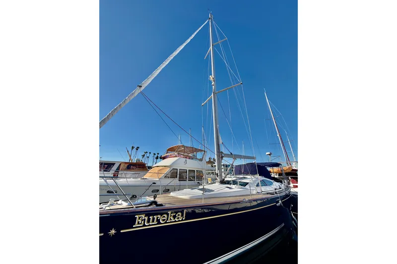 Slide: The Image of 2007 Jeanneau Sun Odyssey 49 DS sailboat docked under clear blue sky. - 3