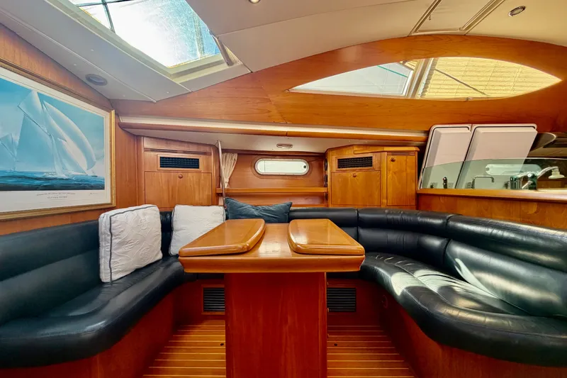 Slide: The Image of Luxurious interior of 2007 Jeanneau Sun Odyssey 49 DS yacht with elegant wood finish. - 56